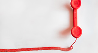 Imagen de  a red desktop phone handle